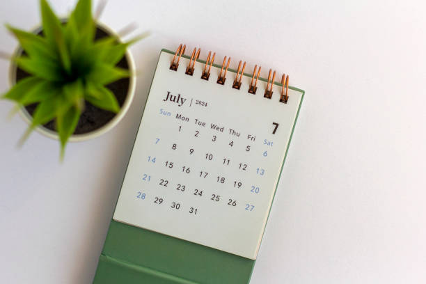 istock July 2024 desk calendar on your desktop for planning. 2158751677