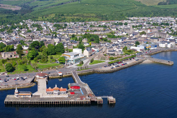 istock Dunoon victorian pier, derelict wooden structure and buildings 2158756291