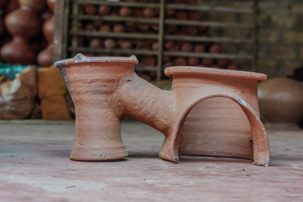 istock Two head Handmade Earthen Clay Firewood Stove 2158757895