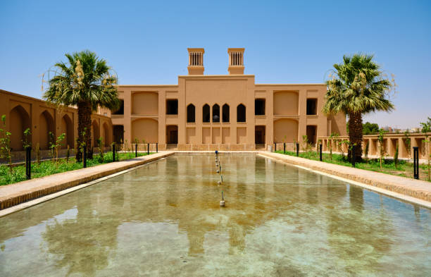istock Adobe pavilion reflection over water pool and in Dowlatabad Garden 2158758402