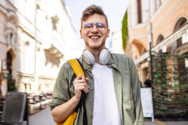 istock Student Walking Down a Bustling Urban Street 2158760189