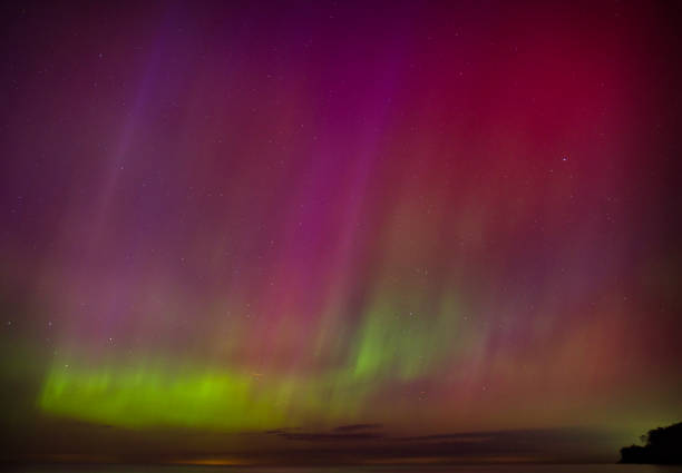 istock Aurora Borealis over Lake Erie during a solar storm 2158762736
