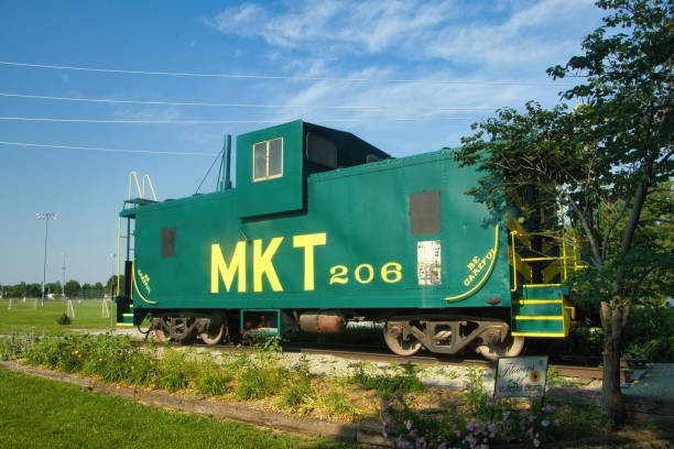 Kingman, AZ - November 12, 2025: A caboose in Locomotive Park in downtown Kingman, located on historic Route 66.