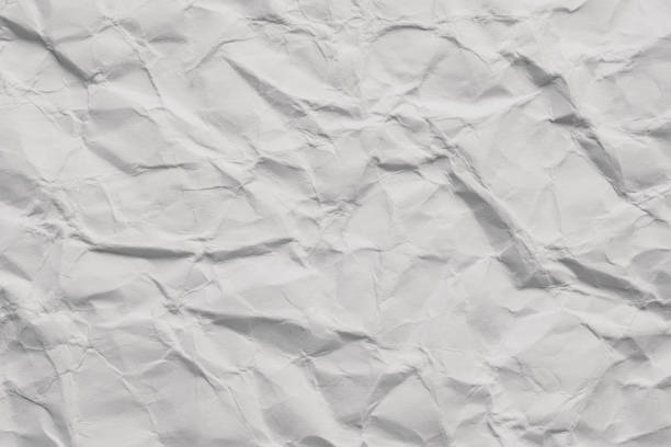 istock Clean white paper, wrinkled, abstract background. 2158768493