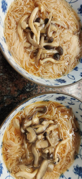 noodle japanese soup with mushrooms toping