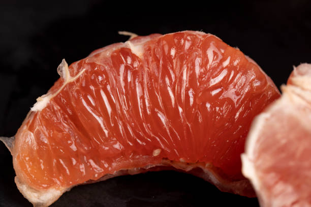 istock slices of peeled grapefruit close-up 2158778368