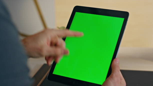istock Freelancer hand tapping mockup tablet touchscreen sitting home workplace closeup 2158782997