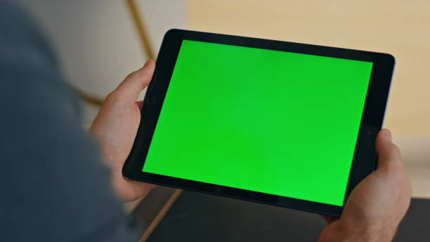 istock Manager looking greenscreen tablet company office closeup. Businessman working 2158783119