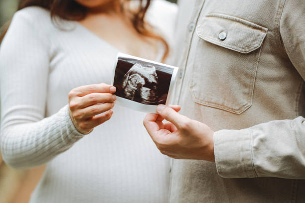 istock Pregnant woman with her husband 2158783588