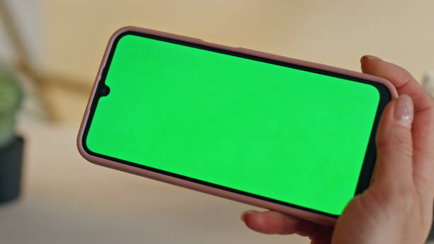 istock Creator finger tapping mockup smartphone at table closeup. Woman hand browsing 2158783591