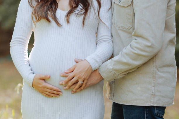 istock Pregnant woman with her husband 2158783602