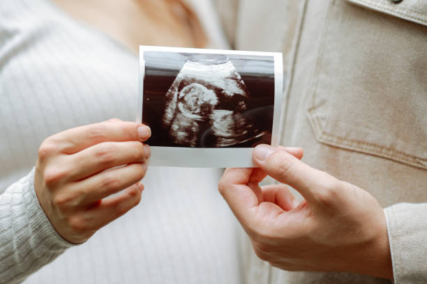 istock Pregnant woman with her husband 2158783642
