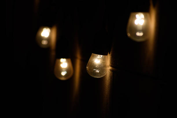 Four Bistro Lights in the Dark