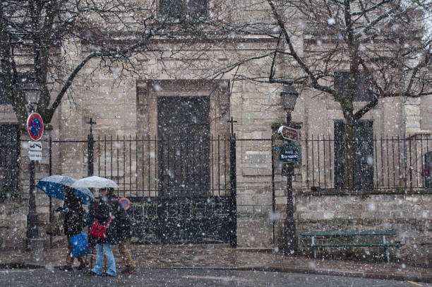 istock Rue du Mont Cenis during a snow storm 2158785333
