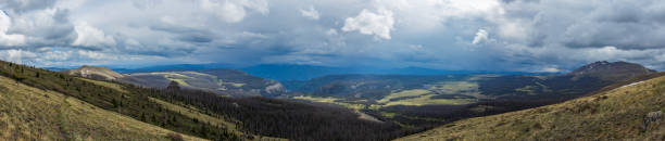 istock mountain panorama with tundra valley and rain clouds 2158786821