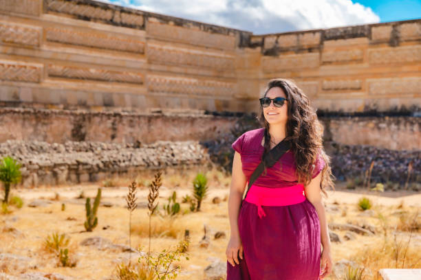 Serene woman  exploring Rajasthani architecture during culture trip to India