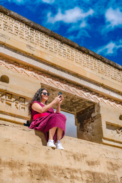 istock Latina Woman Taking Selfie at Mitla Ruins 2158791576