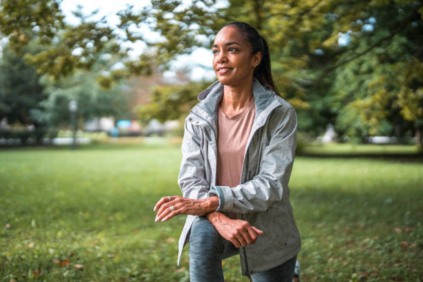 istock Hispanic Female Stretching at Park 2158791978