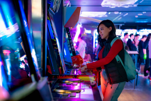 istock Young Latina Woman Gaming in Akihabara 2158793113