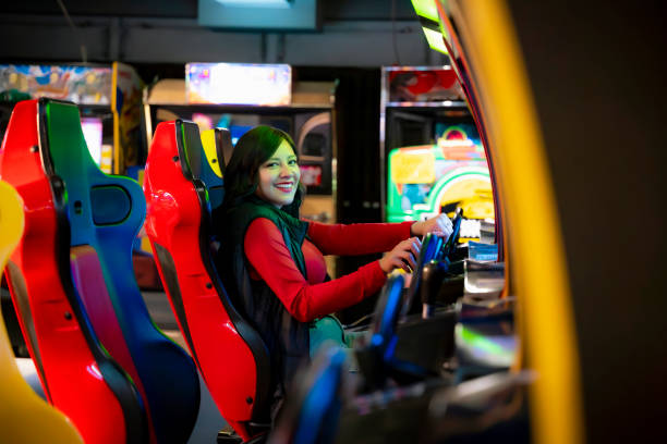 istock Latina Enjoying Arcade Games in Tokyo 2158793122