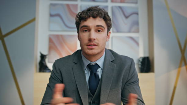 istock Closeup hr specialist videocalling online in creative agency. Man making webinar 2158794199