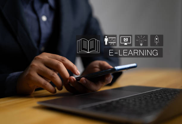 istock Online education concept. Person with virtual E-learning icon for online education training and e-learning webinar on internet. Increase business working skills. Education internet technology. 2158797116