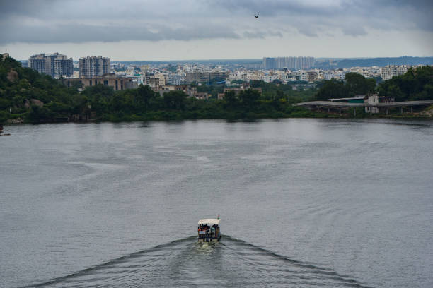 A Telengana Tourism boat strolling in Durgam Cheru Lake in Hyderabad