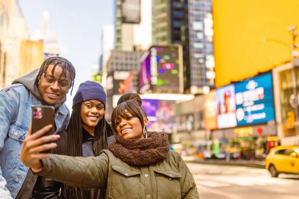 istock Group Selfie in Times Square During Daytime 2158798594