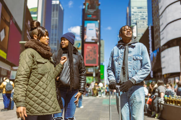 istock Friends Enjoying Day Out in Times Square 2158798637