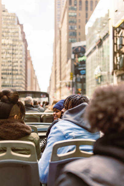 istock Tourists on Double-Decker Bus in City Morning 2158798683