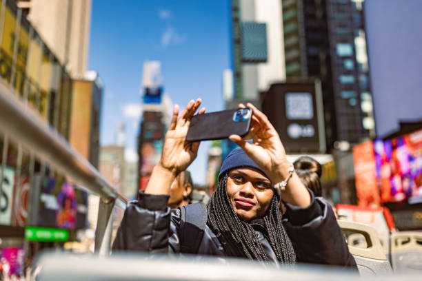 istock Tourist Capturing Cityscape on Smartphone in Daylight 2158798728