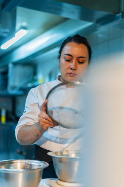 istock Beautiful woman cooking 2158798764