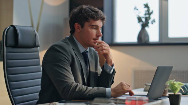 istock Office man typing keyboard closing laptop lid at buro closeup. Happy guy resting 2158800690