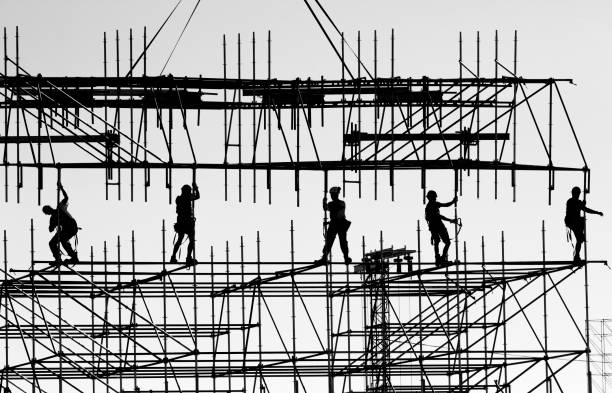Low Angle View Of Silhouette Man Jumping Against Clear Sky