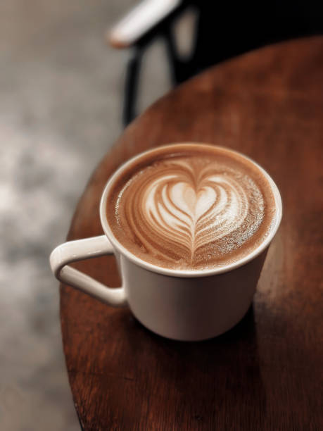 istock Beautiful heart latte on a wooden table 2158805274