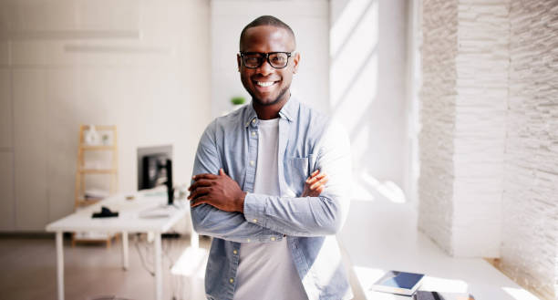 istock Confident African American Businessman Leads Diverse Team in Office 2158807911