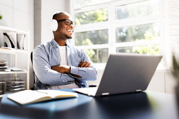 istock Remote Learning and Happy Headphones: African American Male Student Studies 2158807948