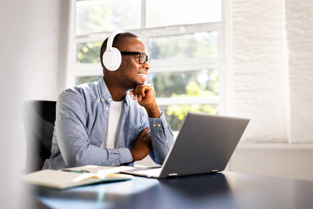 istock Young African American student embraces online studying with laptop 2158807965