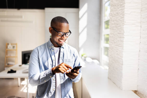 istock Multicultural businessman reading financial message on smartphone 2158807971