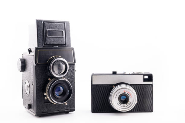 istock two black retro film cameras, 135 mm and medium format 2158808223