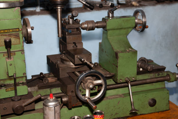 istock old lathe machine in an workshop, small business startup in Africa 2158811440