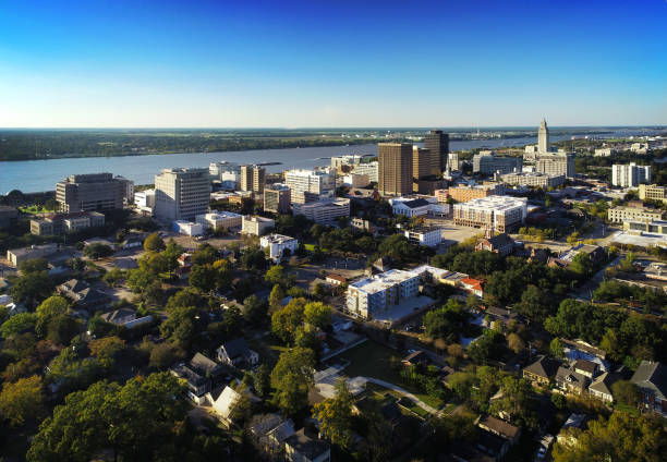 Aerial of Downtown Baton Rouge skyline with the Mississippi River in the background.