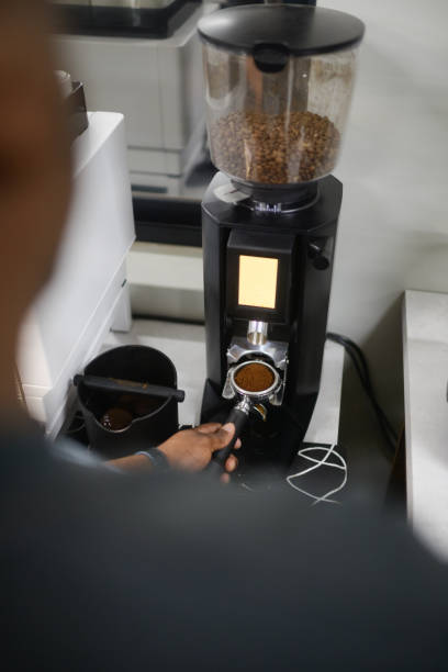 istock Grinding coffee beans barista POV 2158813541