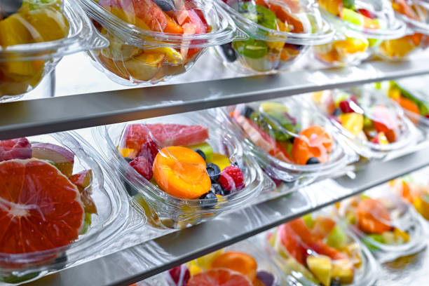 istock Boxes with pre-packaged fruit salads in a commercial fridge 2158815163