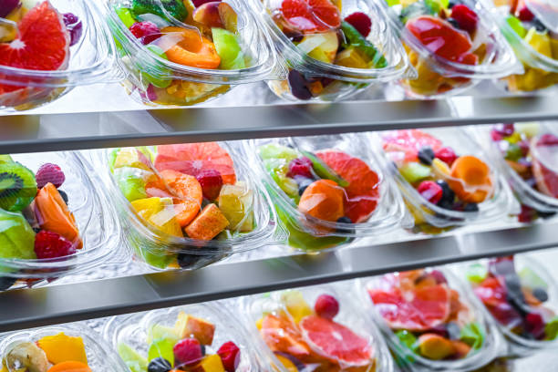 istock Boxes with pre-packaged fruit salads in a commercial fridge 2158815192