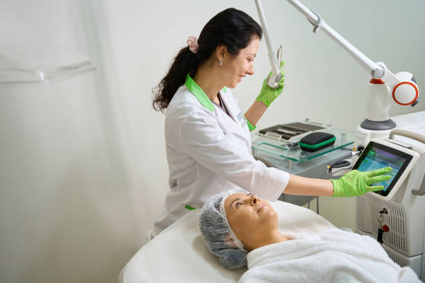 istock Specialist cosmetologist performs a hardware cosmetology procedure using modern equipment 2158816847