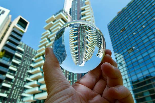 istock Crystal ball against skyscrapers 2158822333
