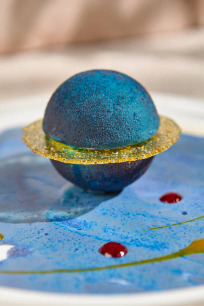 istock Planet-Shaped Cosmic Mousse Dessert with Summer Sunlight and Shadows 2158827914