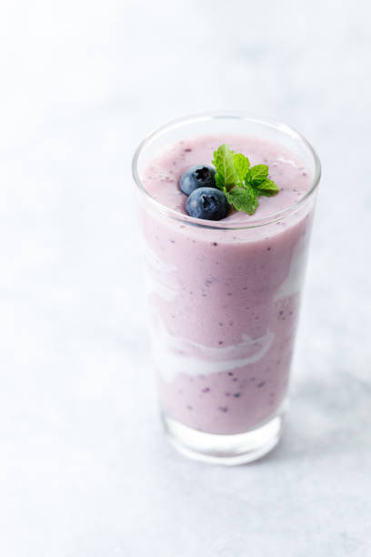istock Blueberry smoothie with yogurt in a glass. 2158827980