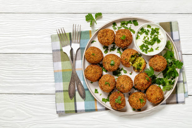 istock fried broccoli cheese balls with sour cream sauce 2158829092